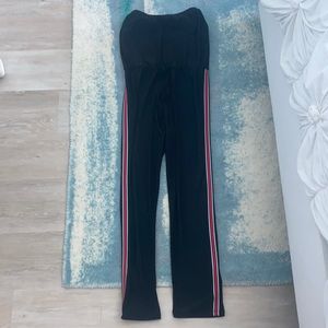 Strapless jumpsuit, red and white stripes on sides w/ tie in front